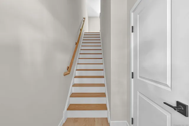 a view of a hallway with staircase