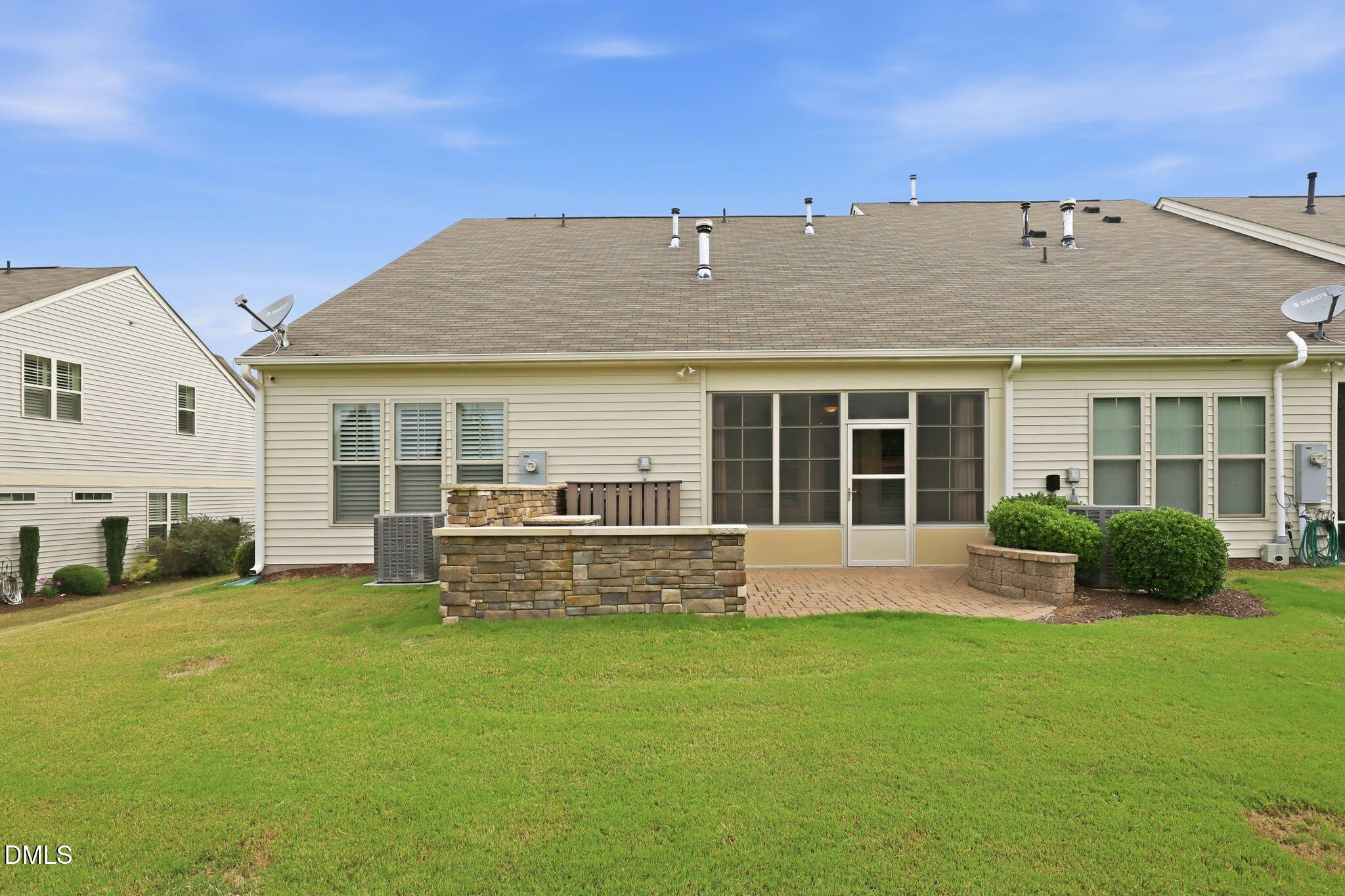 522 Brunello Drive Wake Forest, NC 27587 - Photo 20 of 24 a front view of a house with a yard and outdoor seating