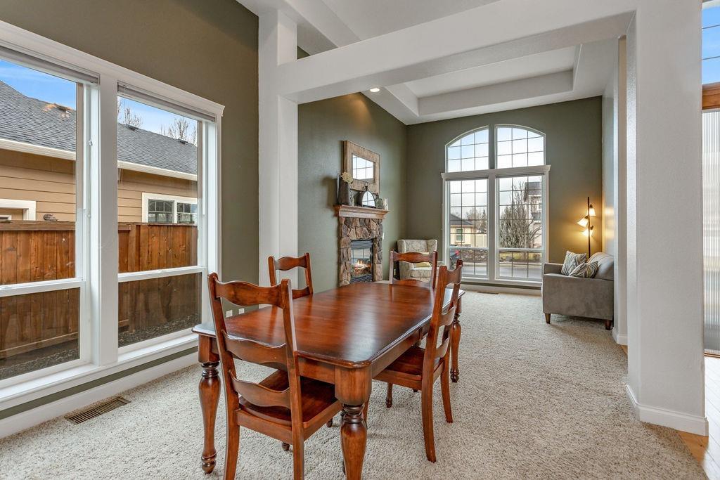1042 Pumpkin Ridge Eagle Point, OR 97524 - Photo 5 of 34 a dining room with furniture and window