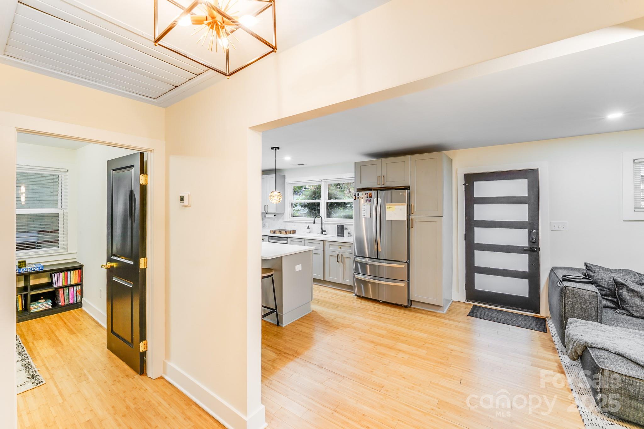 4910 Valley Stream Road Charlotte, NC 28209 - Photo 14 of 35 a view of kitchen with furniture and refrigerator
