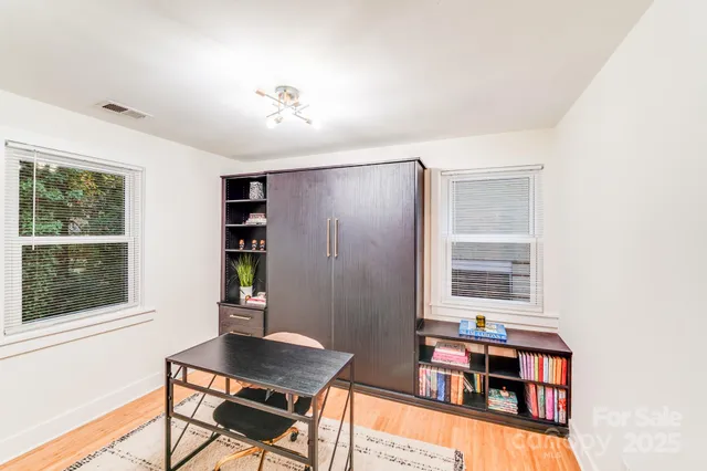 a room with furniture and window