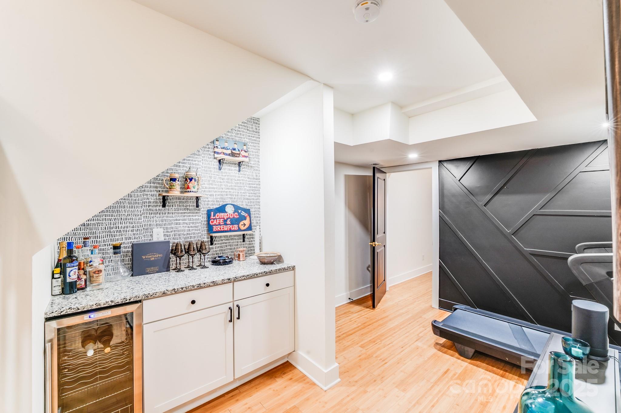 4910 Valley Stream Road Charlotte, NC 28209 - Photo 26 of 35 a hallway with cabinets