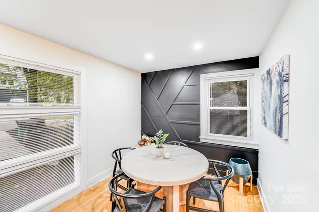 a workspace with furniture and window