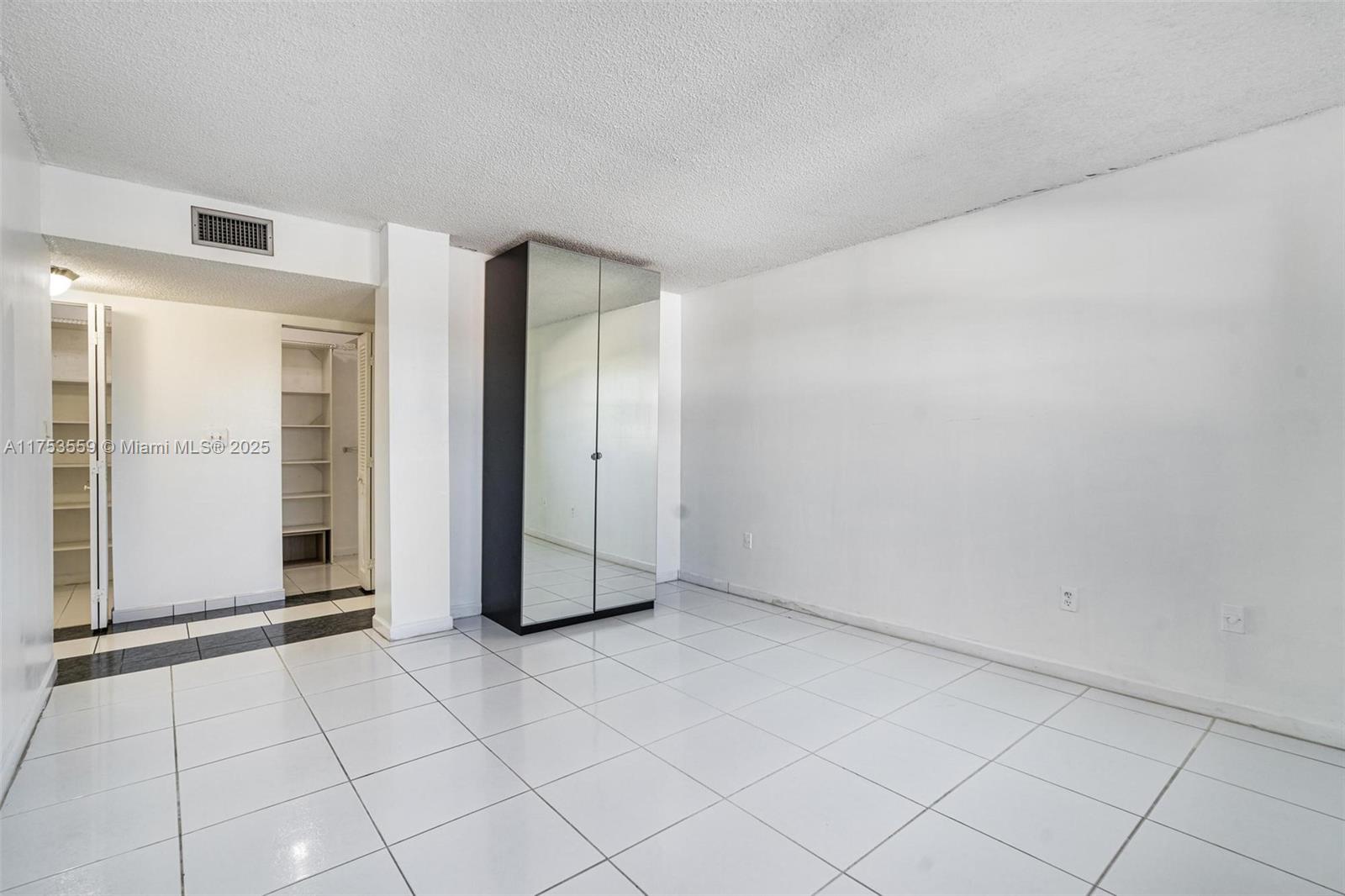 7300 Wayne Avenue, Unit 317 Miami Beach, FL 33141 - Photo 16 of 26 a view of an empty room
