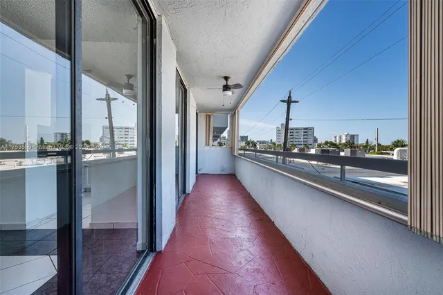 a view of a living room with a large window