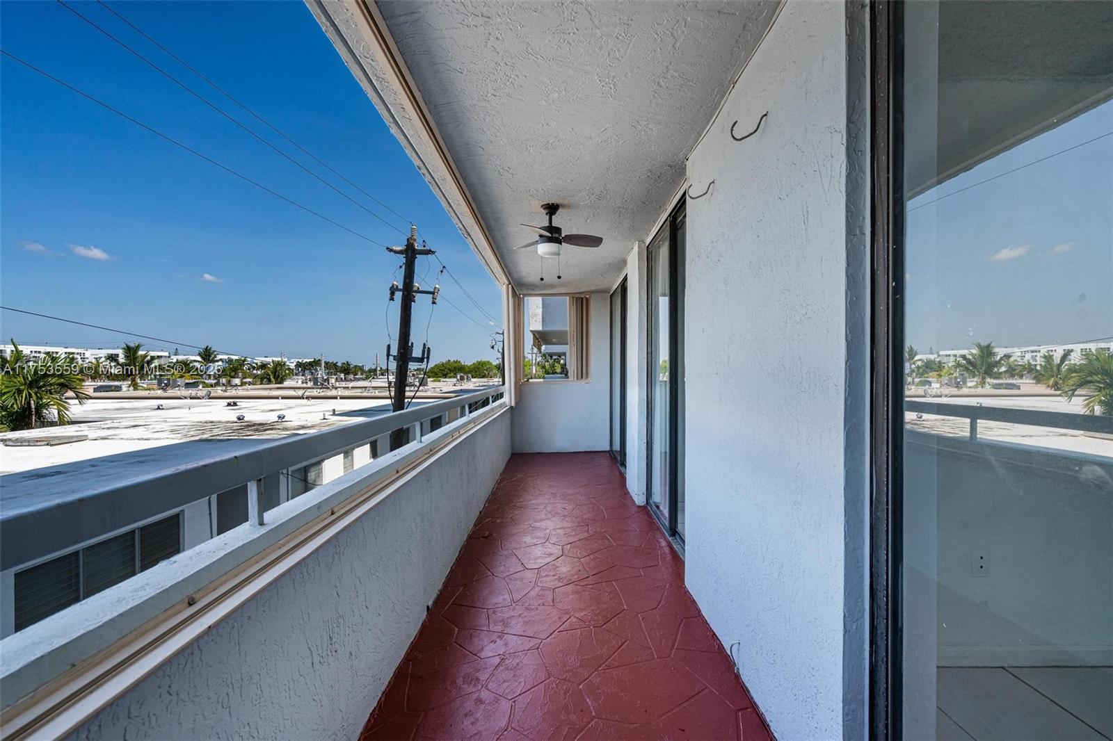 7300 Wayne Avenue, Unit 317 Miami Beach, FL 33141 - Photo 19 of 26 a view of a kitchen with a large window