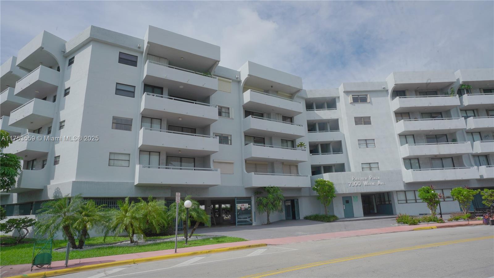 7300 Wayne Avenue, Unit 317 Miami Beach, FL 33141 - Photo 2 of 26 a view of a building with a street
