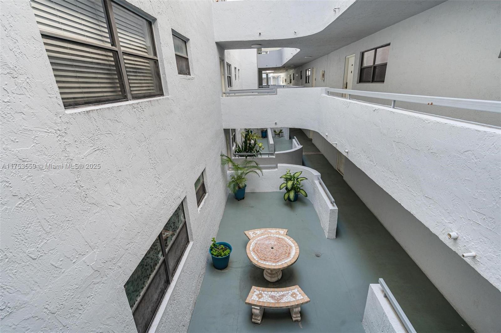 7300 Wayne Avenue, Unit 317 Miami Beach, FL 33141 - Photo 21 of 26 a view of entryway with wooden floor