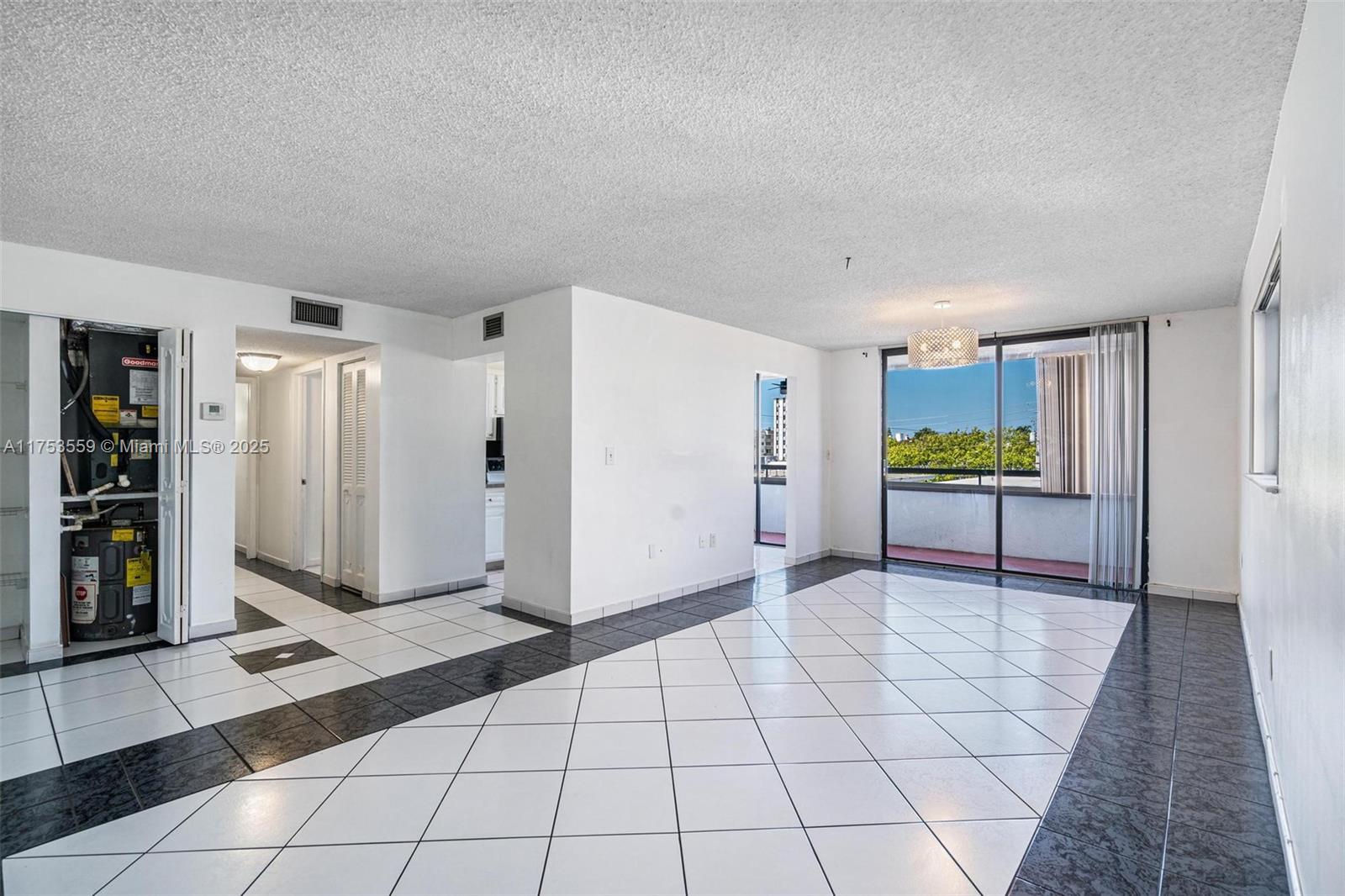 7300 Wayne Avenue, Unit 317 Miami Beach, FL 33141 - Photo 6 of 26 a view of livingroom with hardwood