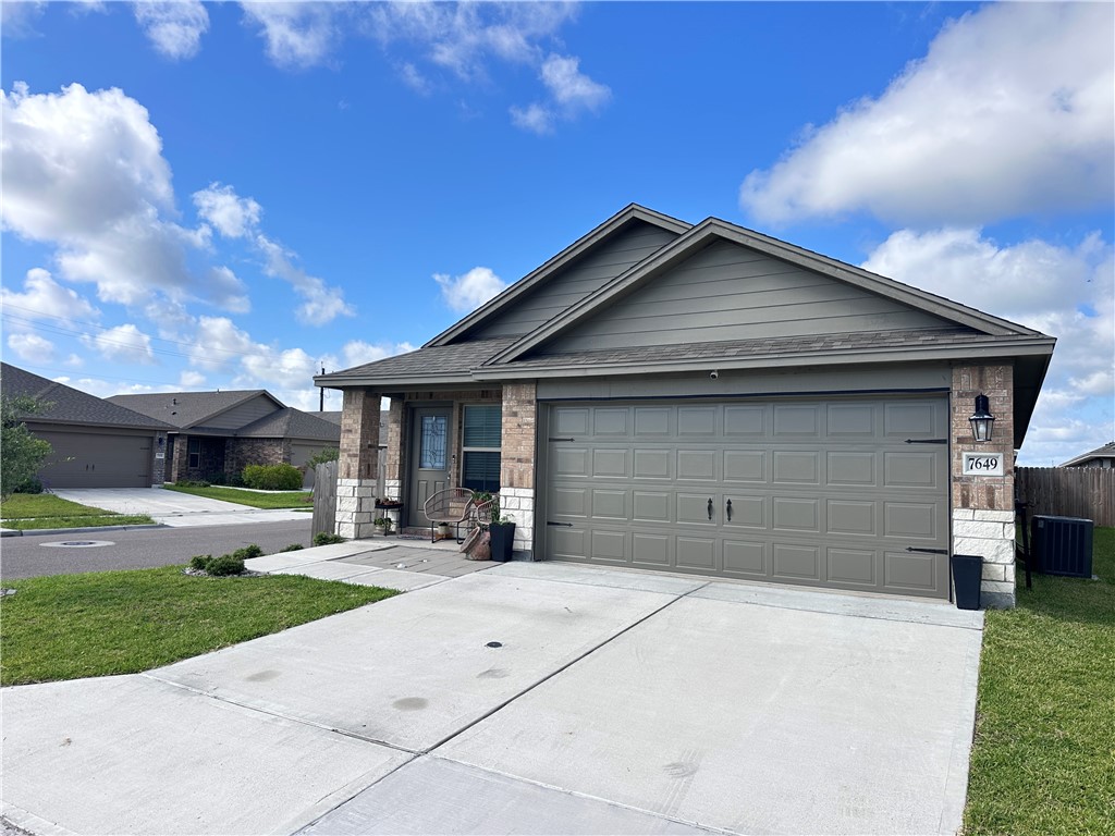 7649 Herd Rider Lane Corpus Christi, TX 78414 - Photo 1 of 18 a house view with a garden space