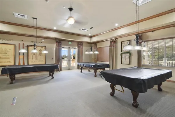 a living room with lots of furniture and a flat screen tv