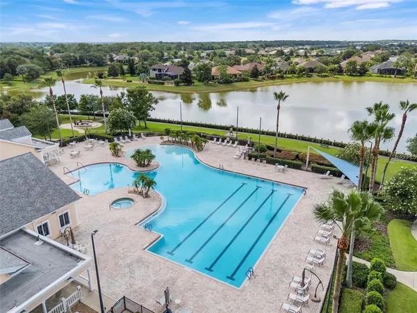 a view of a swimming pool with a patio