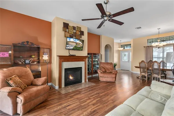 a living room with furniture or couch and a fireplace