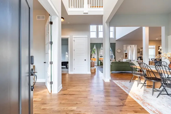 a view of an entryway and livingroom with furniture