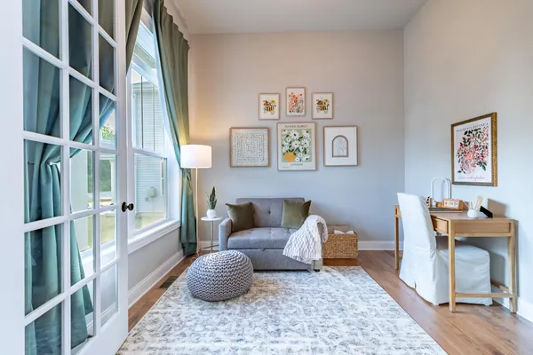 a living room with furniture and a window
