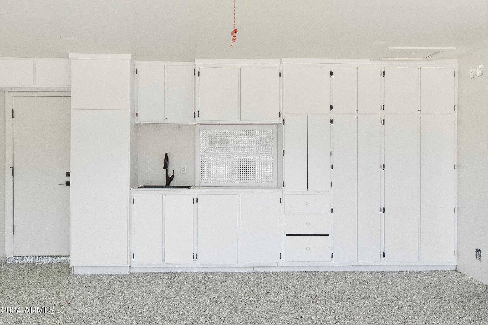 1643 West Griswold Road Phoenix, AZ 85021 - Photo 18 of 81 a view of white cabinets