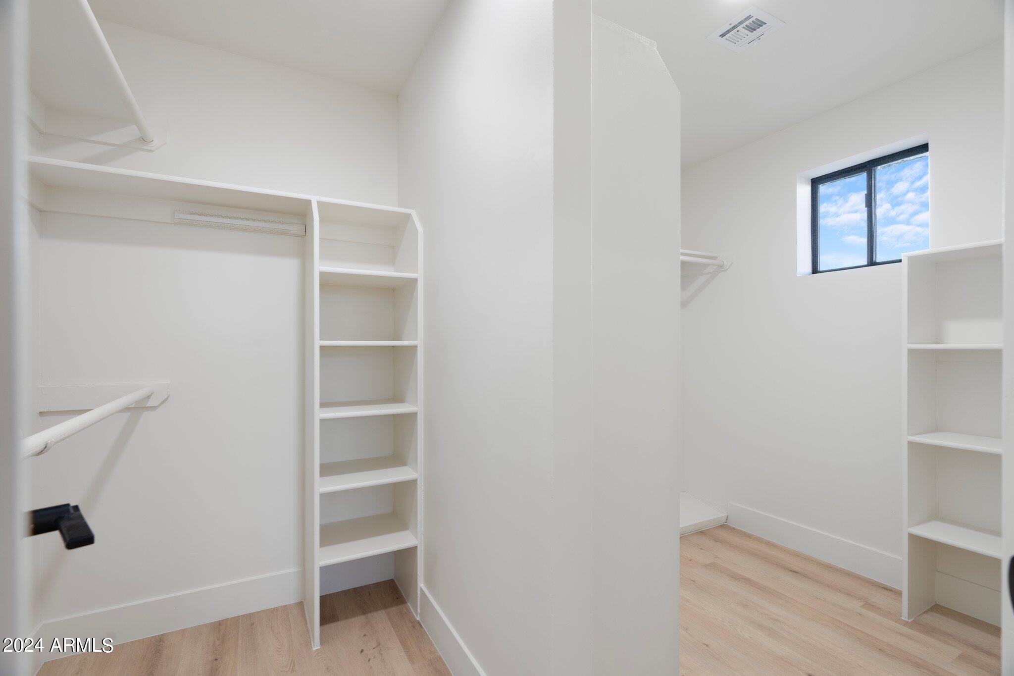 1643 West Griswold Road Phoenix, AZ 85021 - Photo 33 of 81 a view of an empty walk in closet