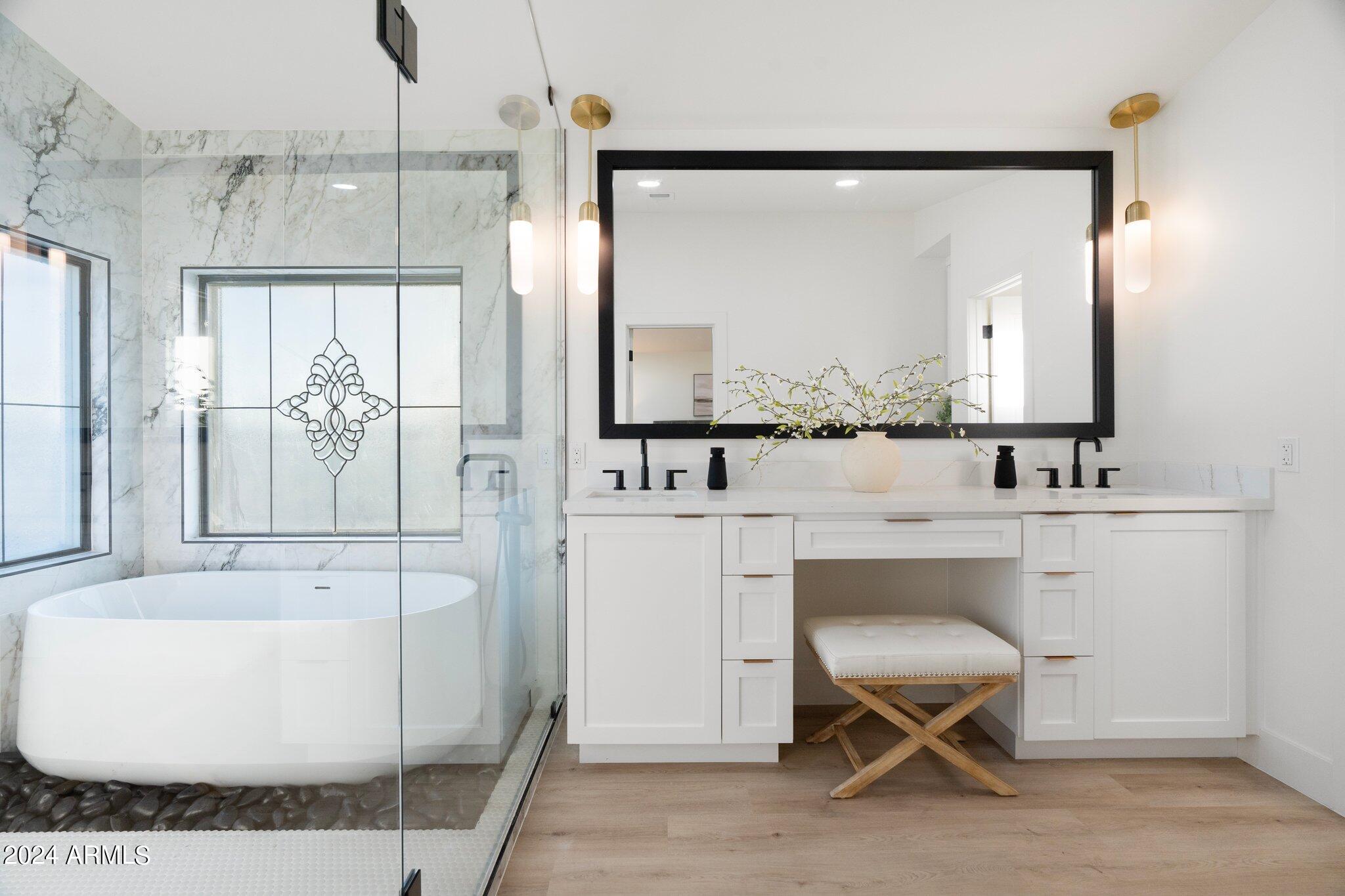 1643 West Griswold Road Phoenix, AZ 85021 - Photo 35 of 81 a bathroom with a sink and a mirror
