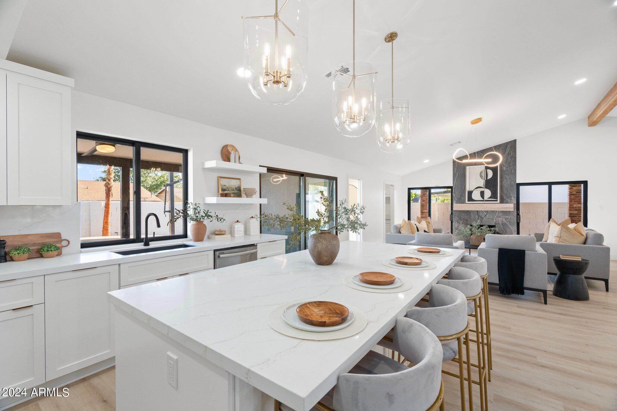 1643 West Griswold Road Phoenix, AZ 85021 - Photo 59 of 81 a view of a dining room with furniture and wooden floor