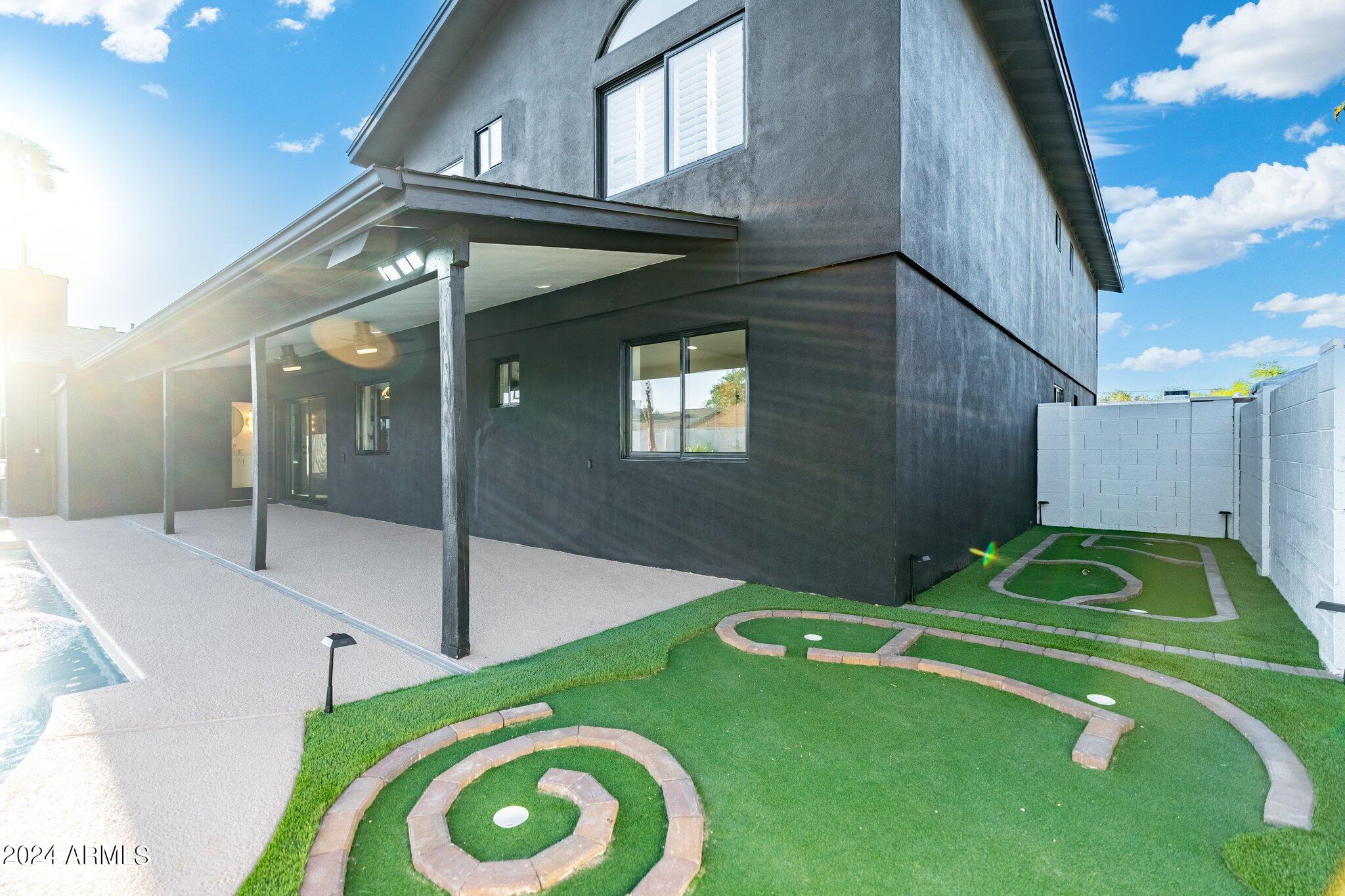 1643 West Griswold Road Phoenix, AZ 85021 - Photo 70 of 81 a bathroom with a sink and a mirror