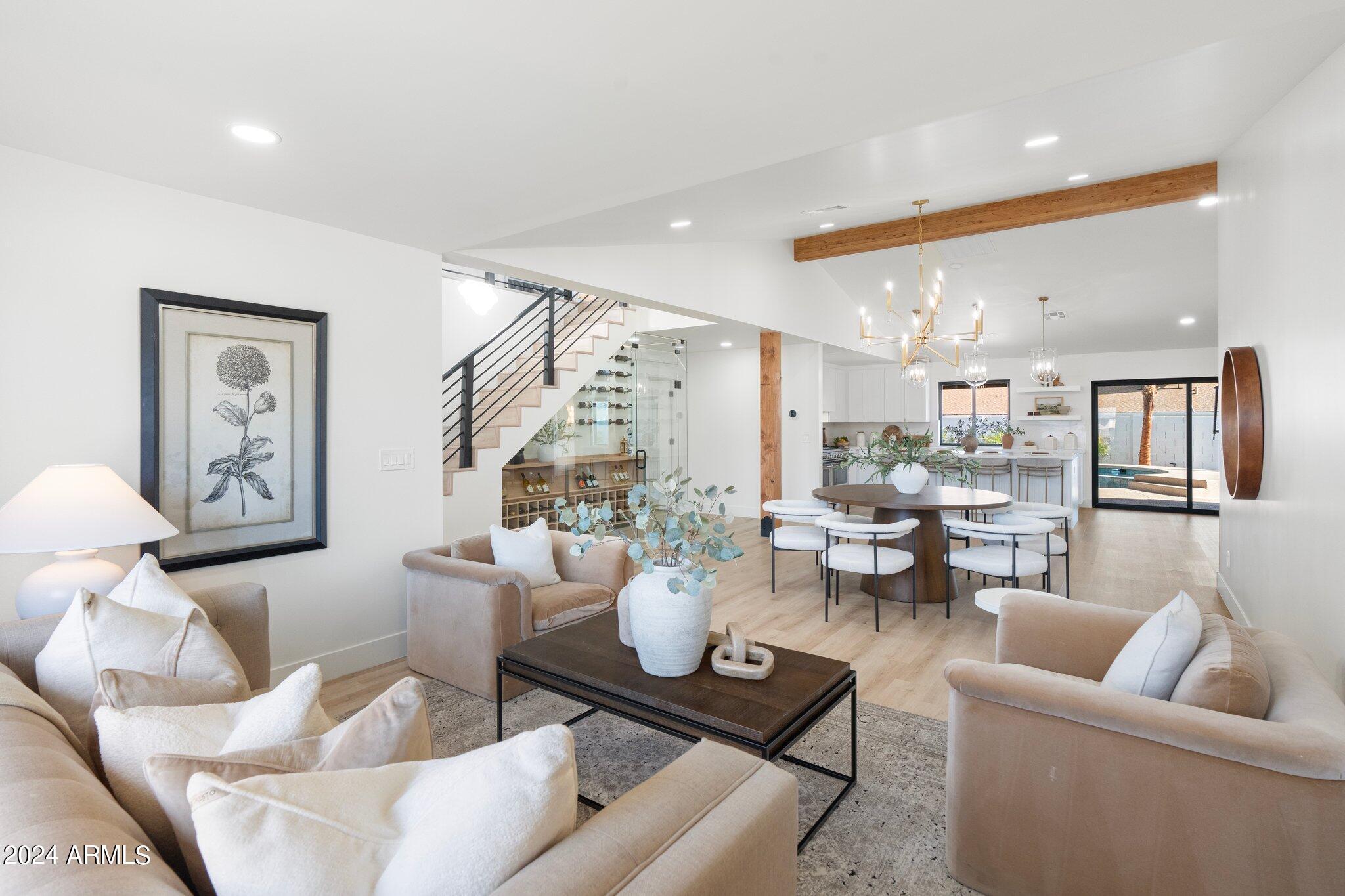 1643 West Griswold Road Phoenix, AZ 85021 - Photo 9 of 81 a living room with furniture and a view of kitchen