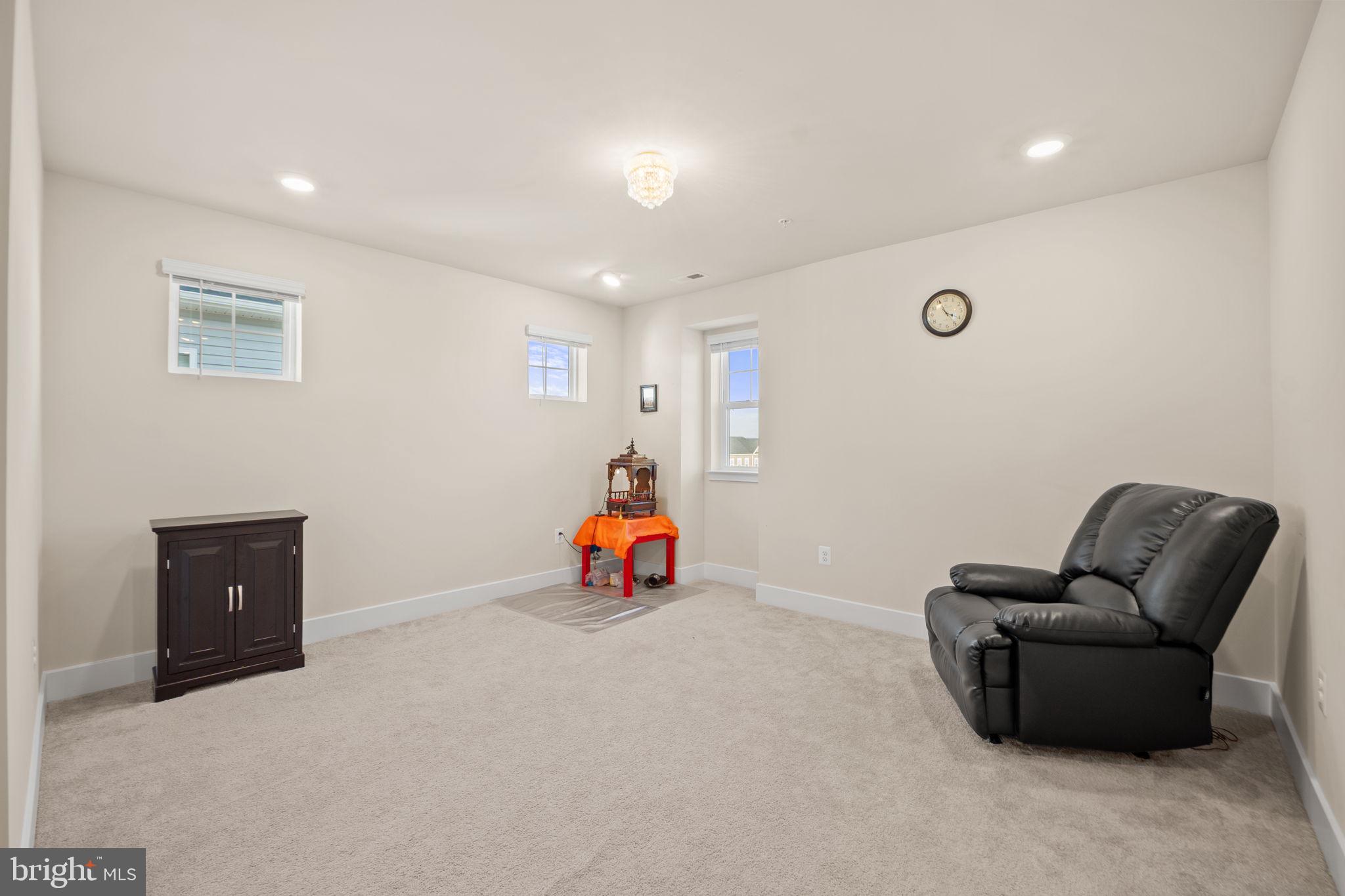 1281 Backbone Way Frederick, MD 21702 - Photo 18 of 40 a view of livingroom with furniture and windows