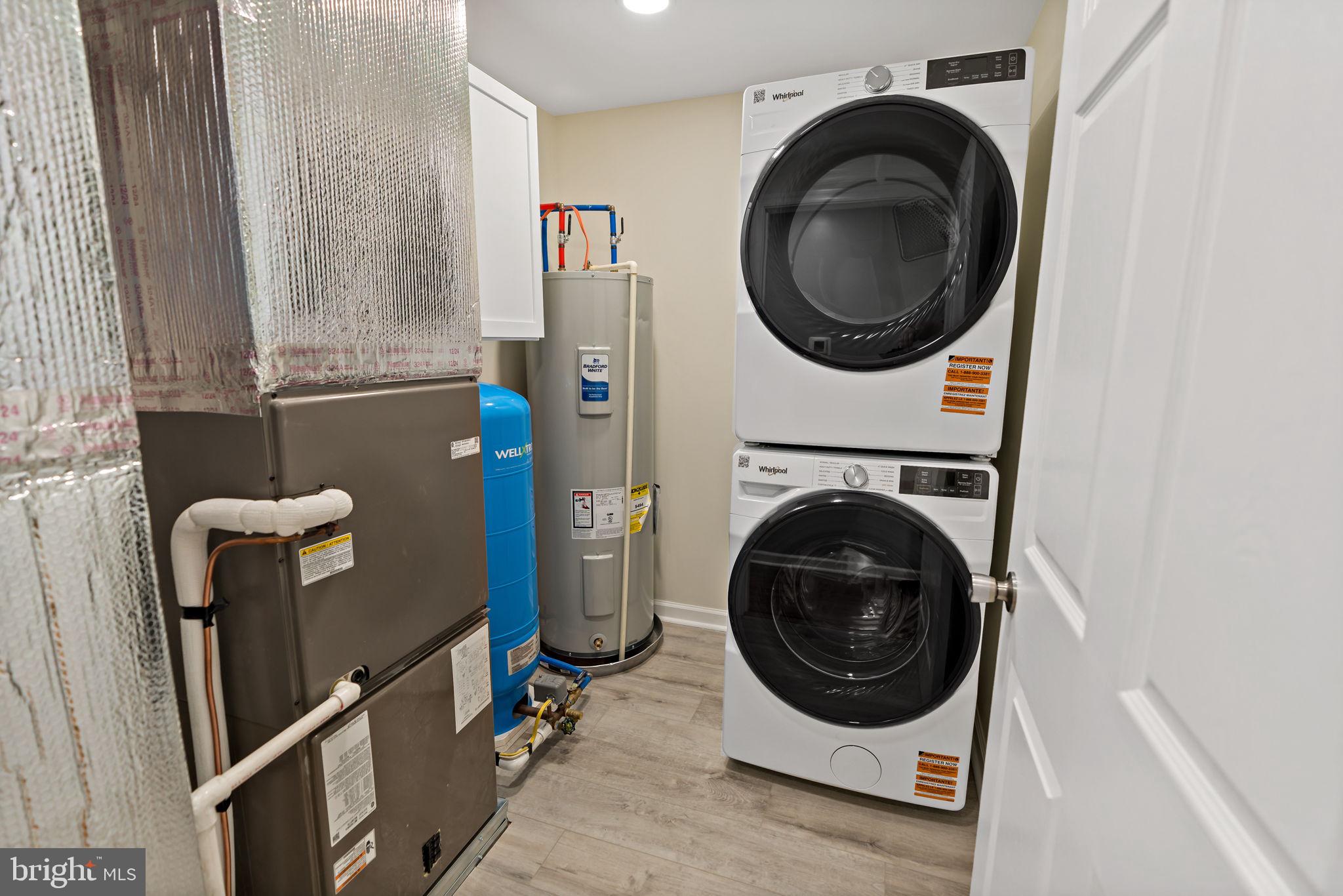 7021 Winchester Grade Road Berkeley Springs, WV 25411 - Photo 15 of 46 Laundry room with regular size stackables