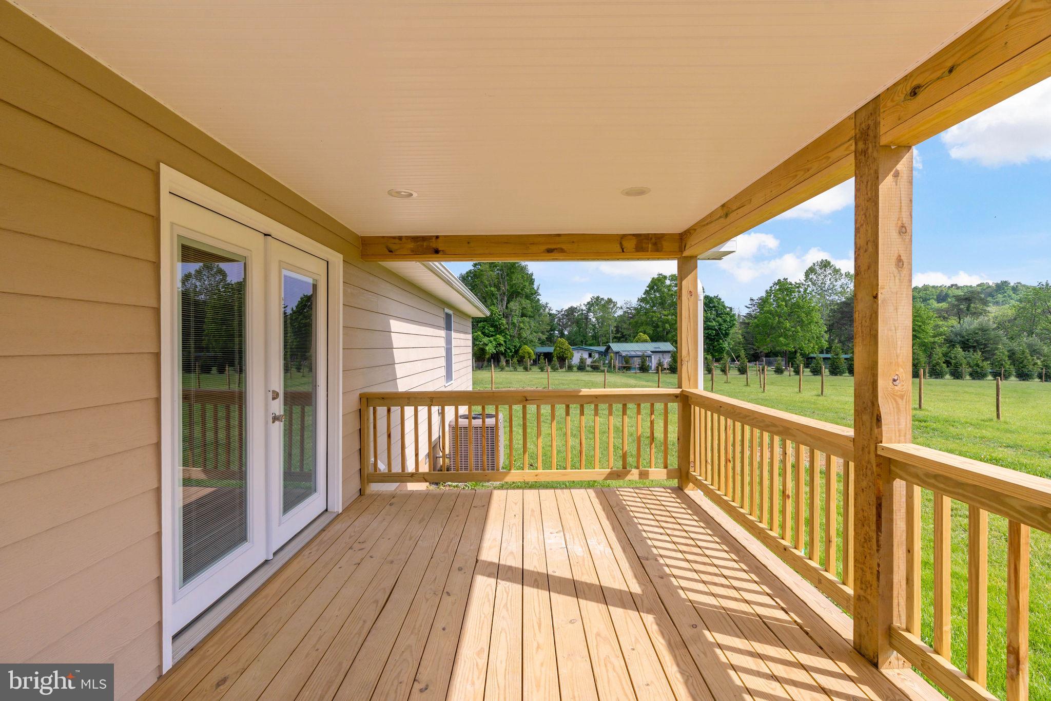 7021 Winchester Grade Road Berkeley Springs, WV 25411 - Photo 33 of 46 French doors leads to and from the nice deck
