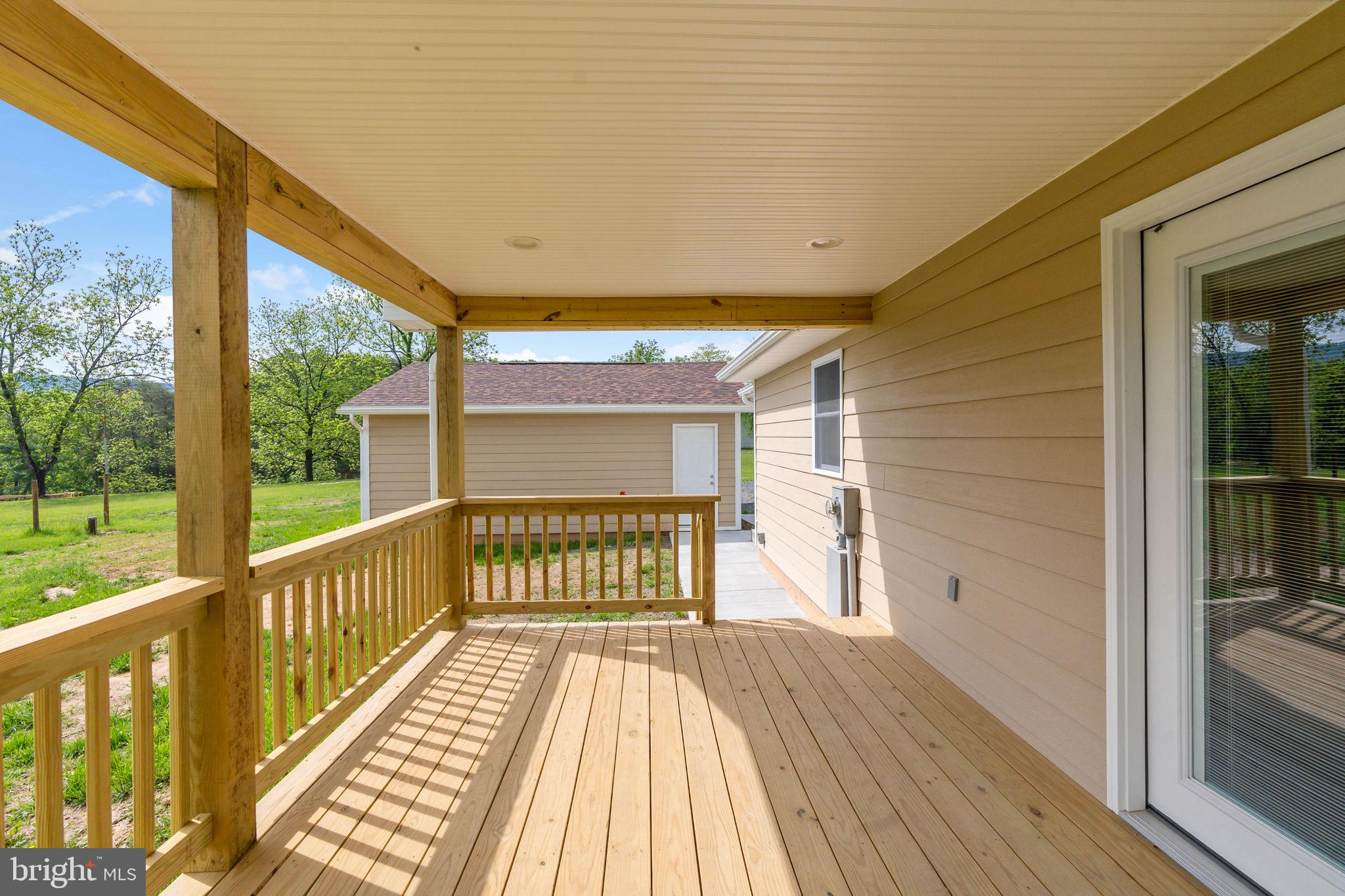 7021 Winchester Grade Road Berkeley Springs, WV 25411 - Photo 35 of 46 Beautiful back covered deck
