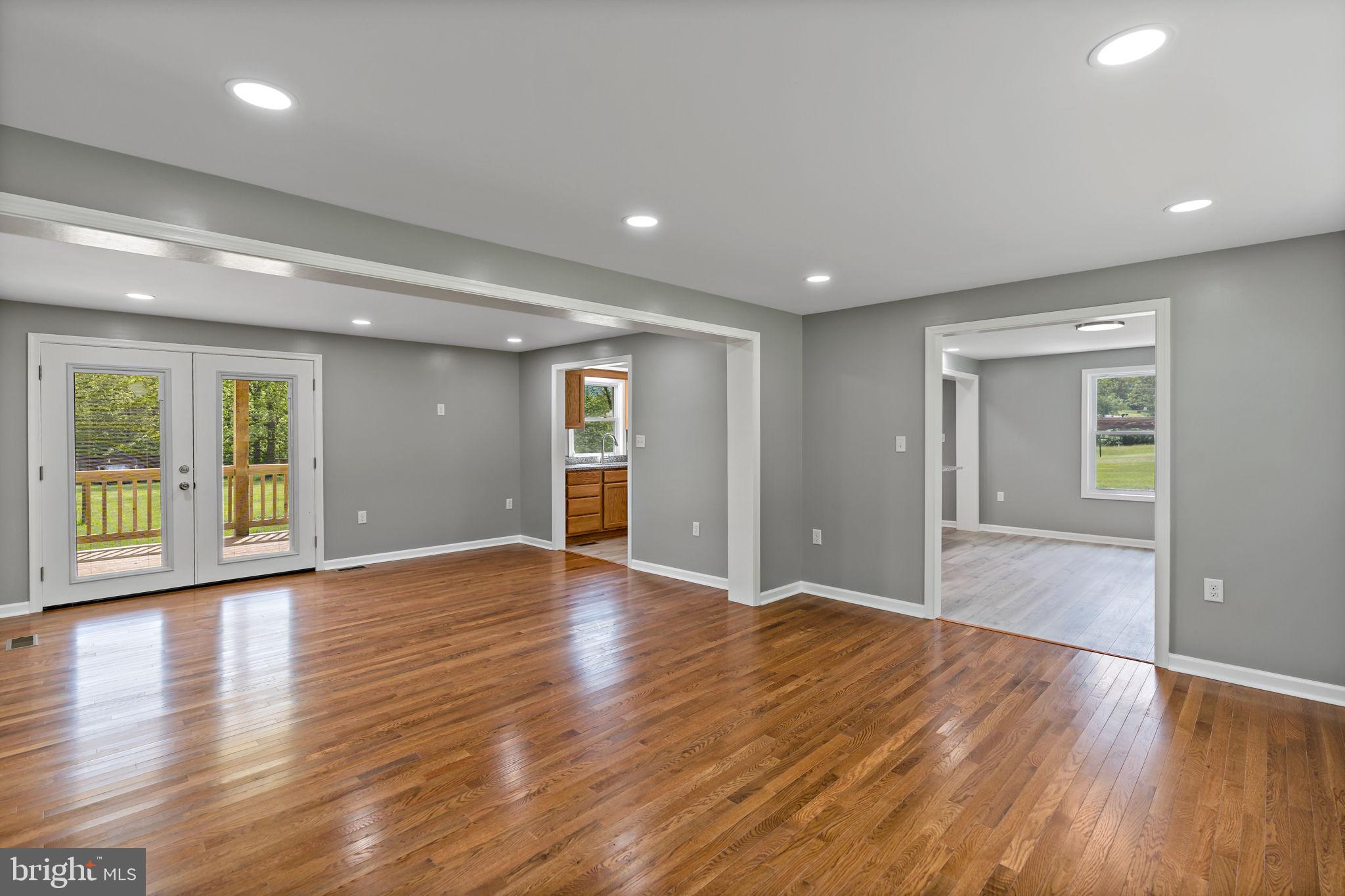 7021 Winchester Grade Road Berkeley Springs, WV 25411 - Photo 10 of 46 Nice open living room with hard wood floor