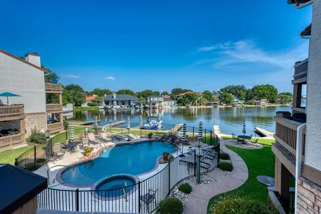 a view of a chairs and table in a patio