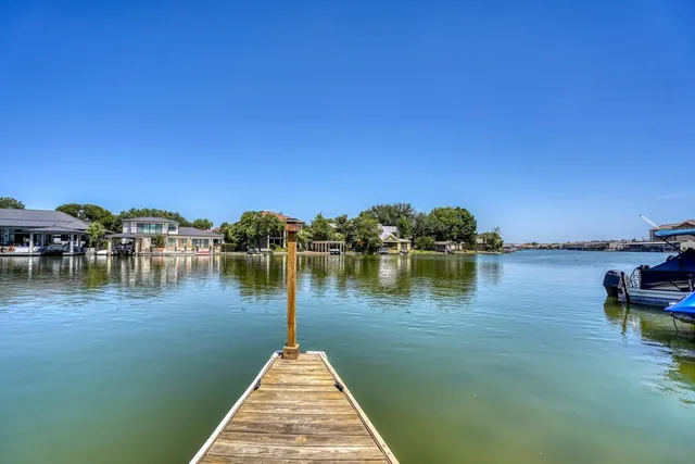 a lake view with a large mountain view