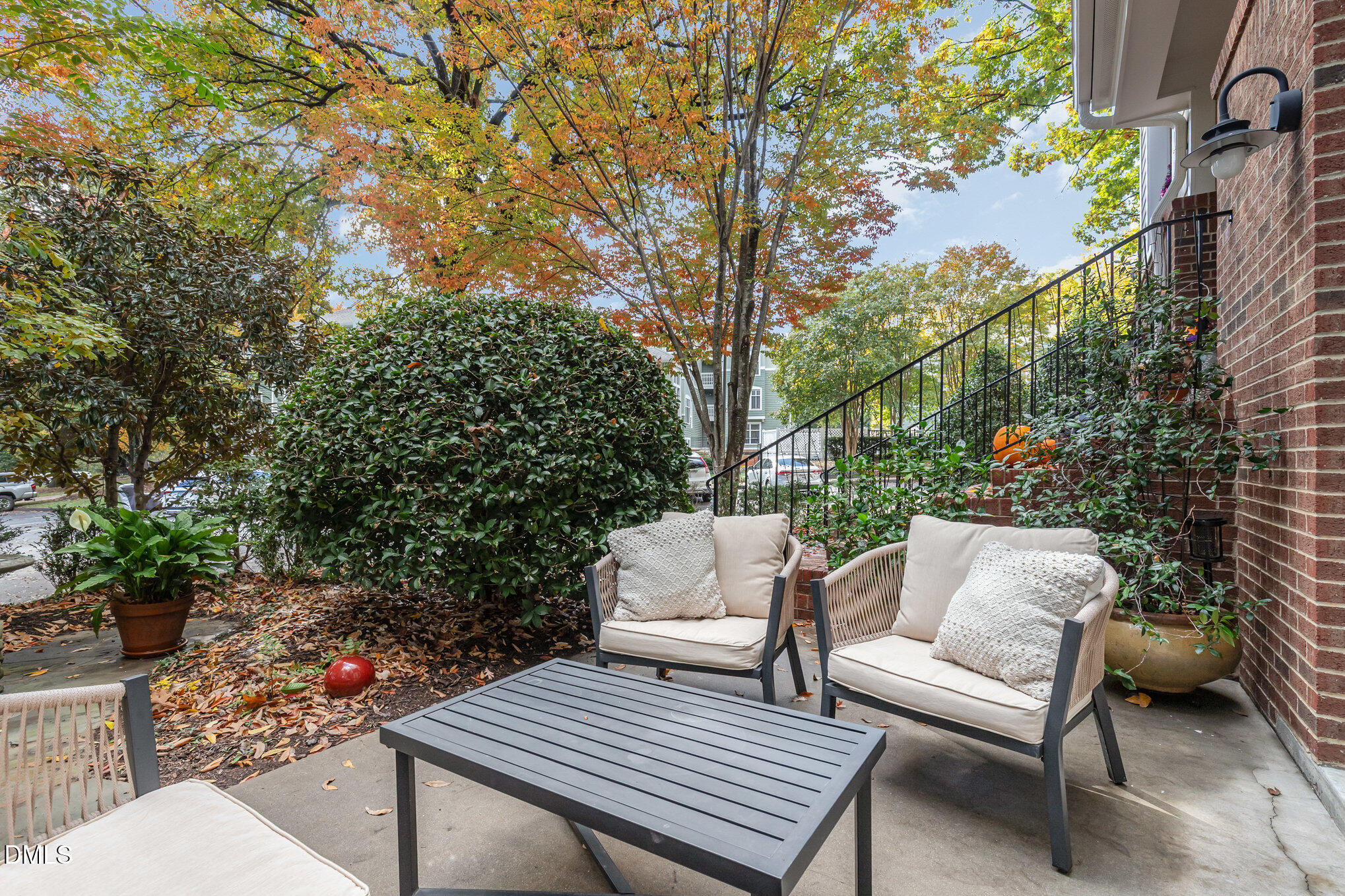 1120 Parkridge Lane, Unit 102 Raleigh, NC 27605 - Photo 25 of 50 a view of a wooden bench in the back yard