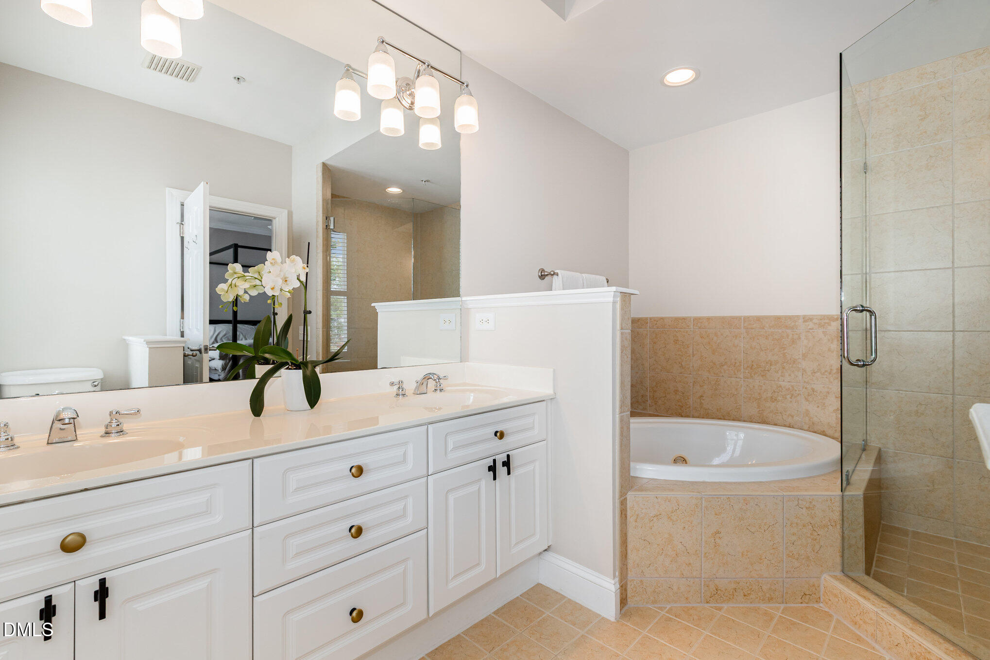 1120 Parkridge Lane, Unit 102 Raleigh, NC 27605 - Photo 29 of 50 a bathroom with a sink a toilet and shower