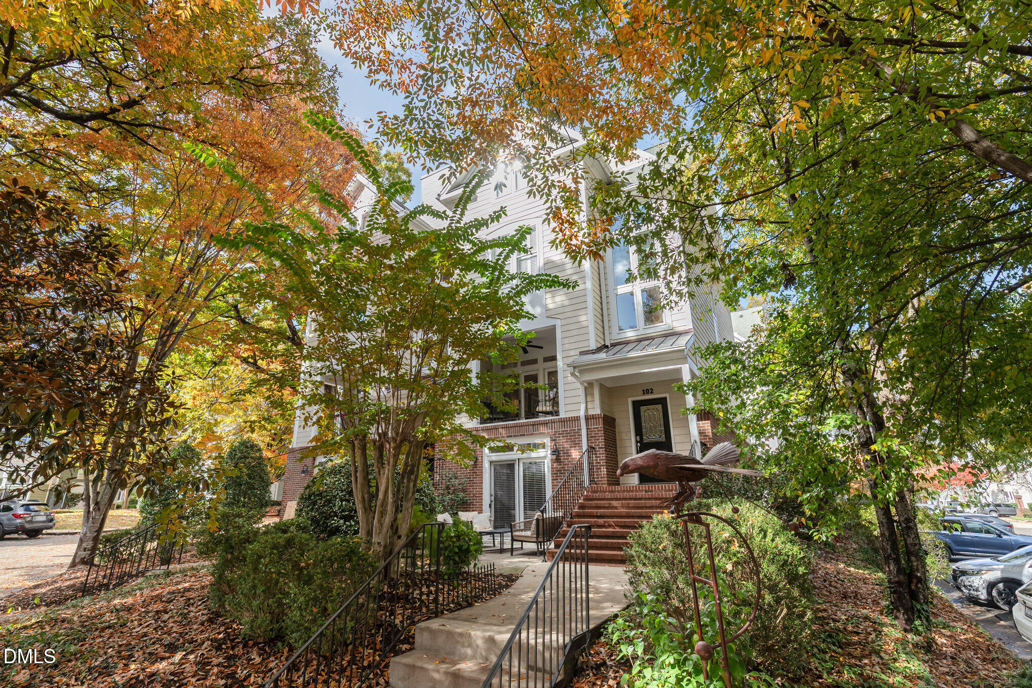 1120 Parkridge Lane, Unit 102 Raleigh, NC 27605 - Photo 3 of 50 front view of a house with a tree