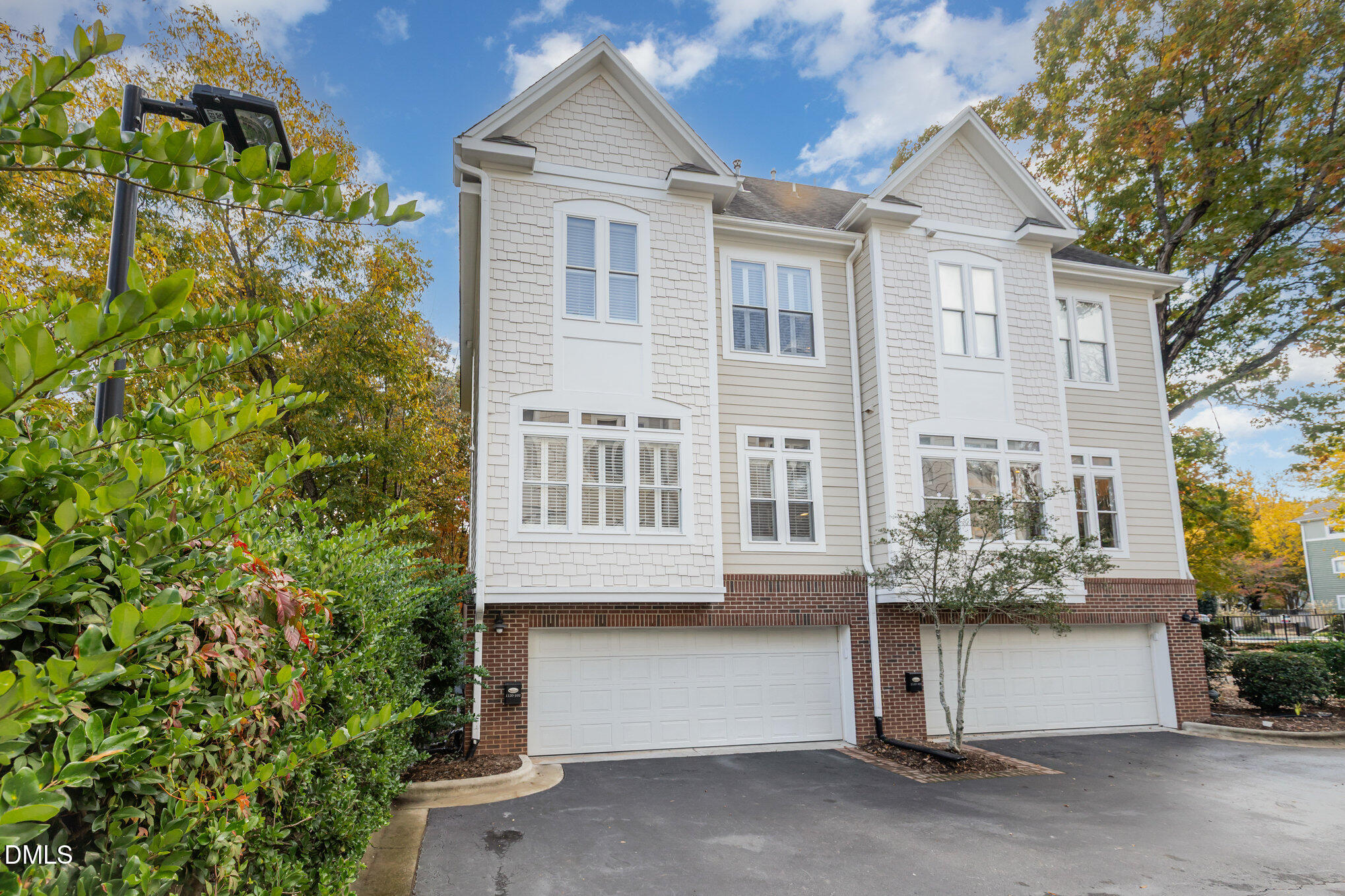 1120 Parkridge Lane, Unit 102 Raleigh, NC 27605 - Photo 39 of 50 a front view of a house with a garden