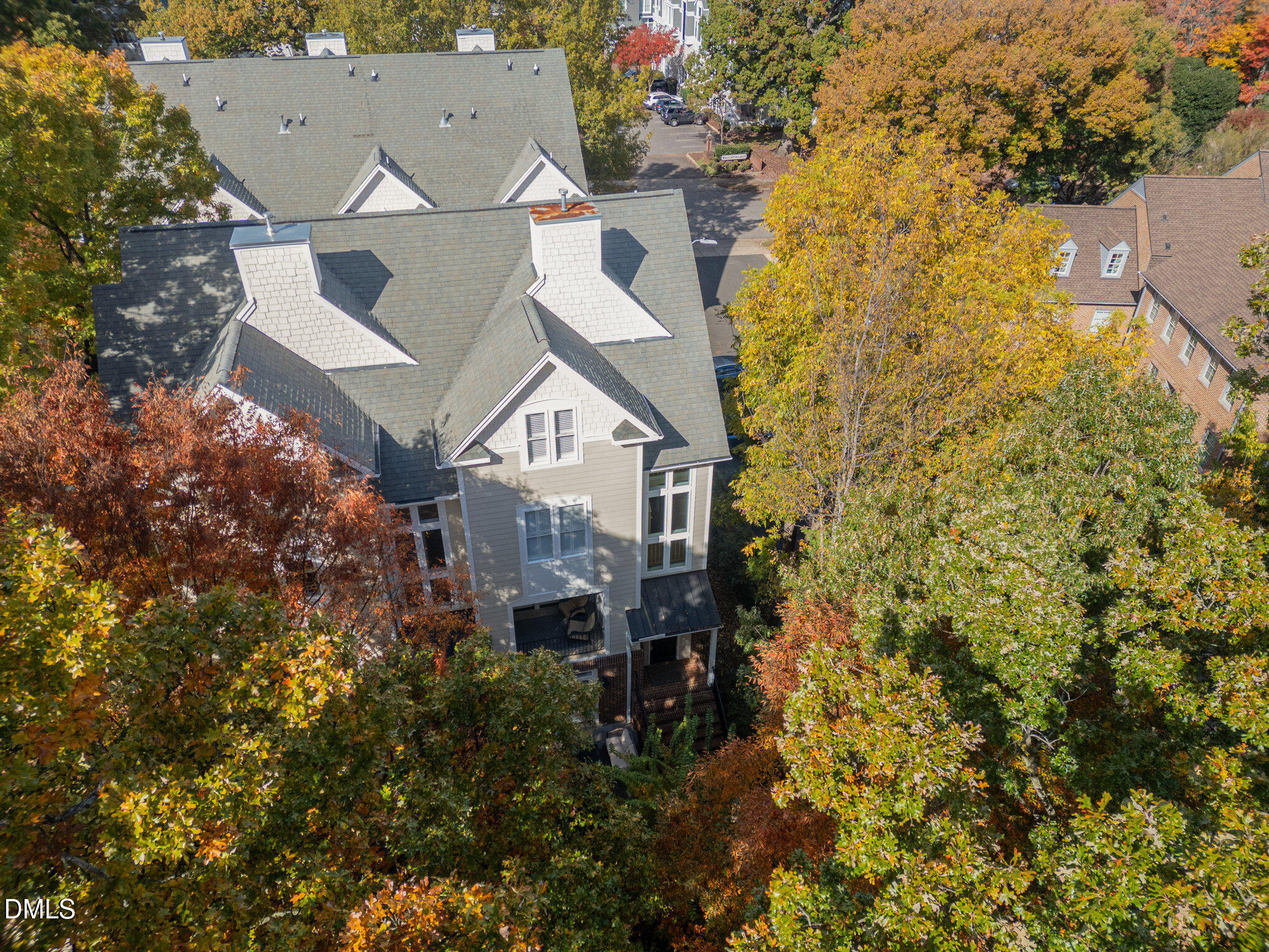 1120 Parkridge Lane, Unit 102 Raleigh, NC 27605 - Photo 40 of 50 a aerial view of a house with a yard and large trees