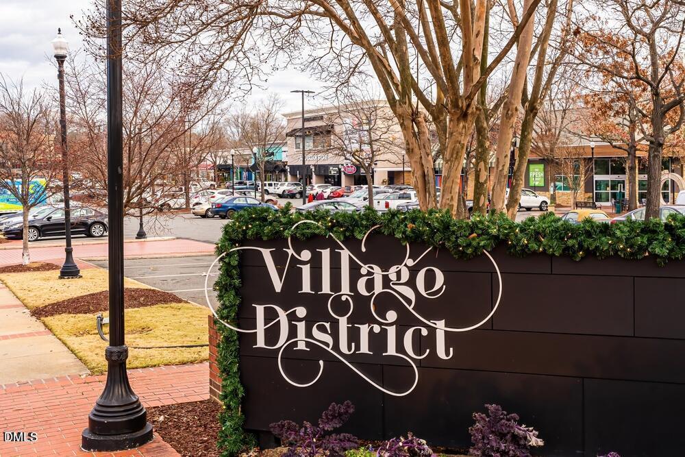 1120 Parkridge Lane, Unit 102 Raleigh, NC 27605 - Photo 50 of 50 a front view of a building with garden