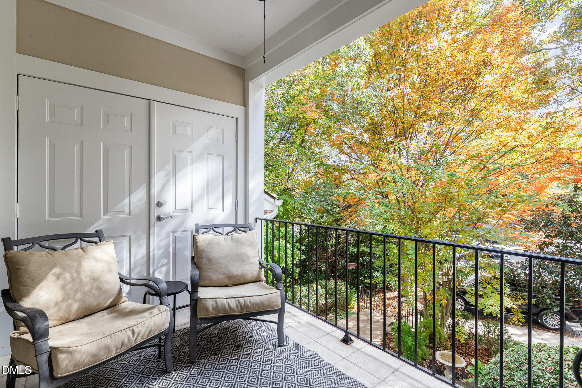 1120 Parkridge Lane, Unit 102 Raleigh, NC 27605 - Photo 6 of 50 a view of a porch with furniture