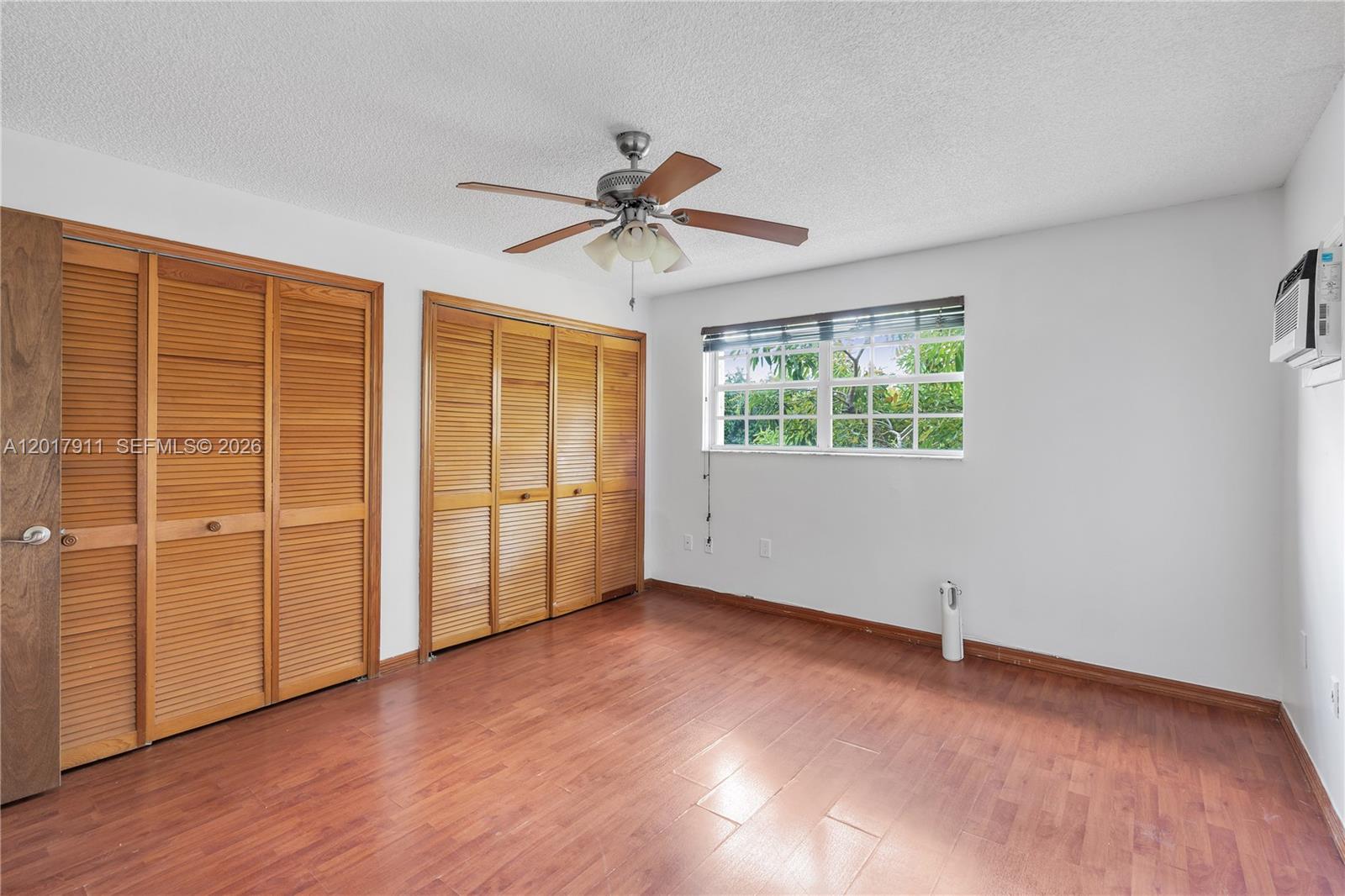 7811 Southwest 9th Terrace Miami, FL 33144 - Photo 19 of 26 Bedroom #3 - upstairs w/extra A/C wall unit.
