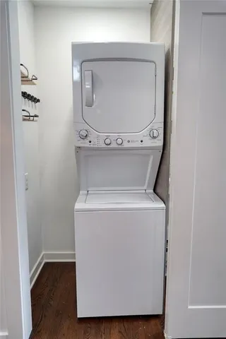 a view of a livingroom with furniture and a flat screen tv