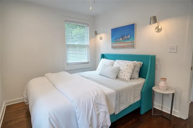 a view of a large building with a big yard and large trees