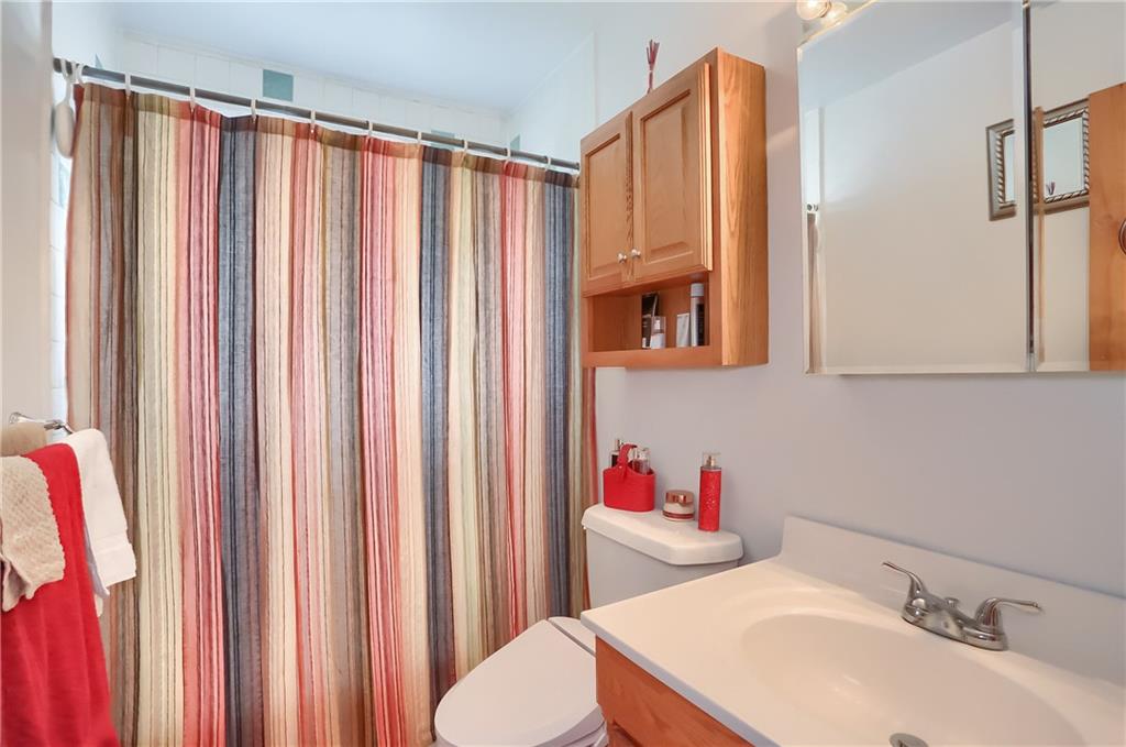 2702 Old Pittsburgh Road New Castle, PA 16101 - Photo 17 of 20 a bathroom with a sink and a mirror