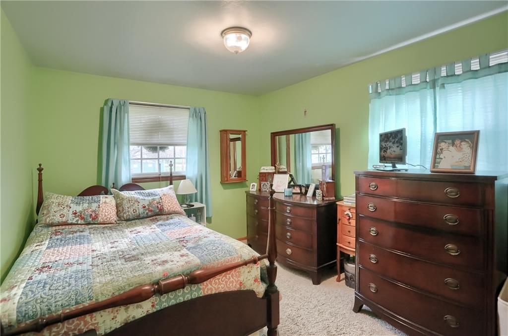 2702 Old Pittsburgh Road New Castle, PA 16101 - Photo 18 of 20 a bedroom with a bed and a dresser