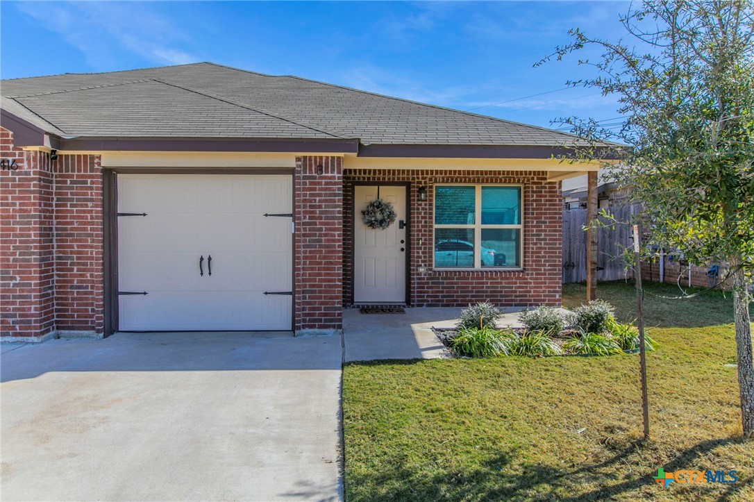 2416 Alterman Drive Temple, TX 76504 - Photo 5 of 15 front view of a house with a yard