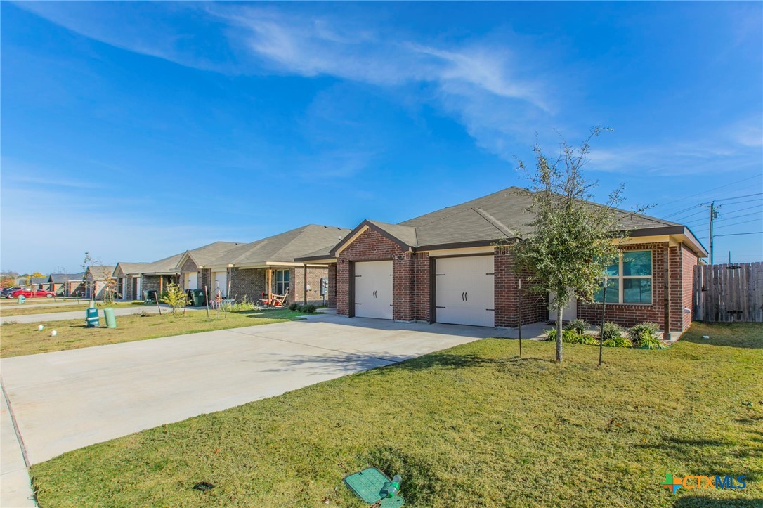 2416 Alterman Drive Temple, TX 76504 - Photo 6 of 15 a front view of a house with a yard