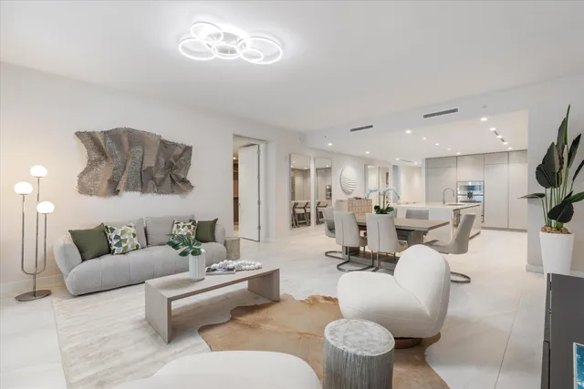 a living room with furniture and a view