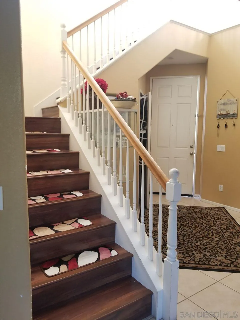 11909 Westview Parkway San Diego, CA 92126 - Photo 2 of 10 a view of entryway with wooden floor
