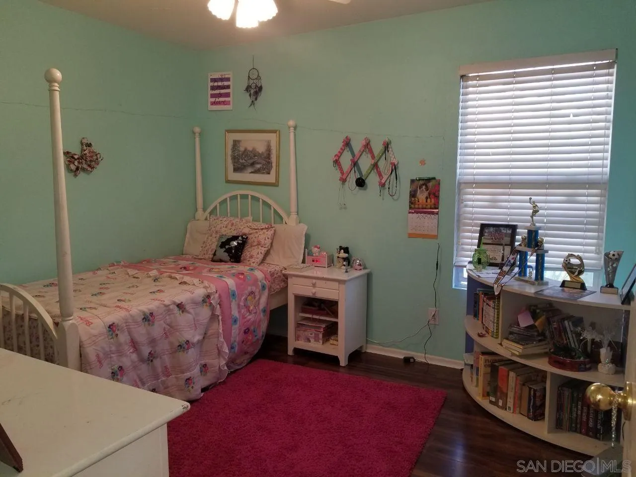 11909 Westview Parkway San Diego, CA 92126 - Photo 3 of 10 a bedroom with a bed and a window
