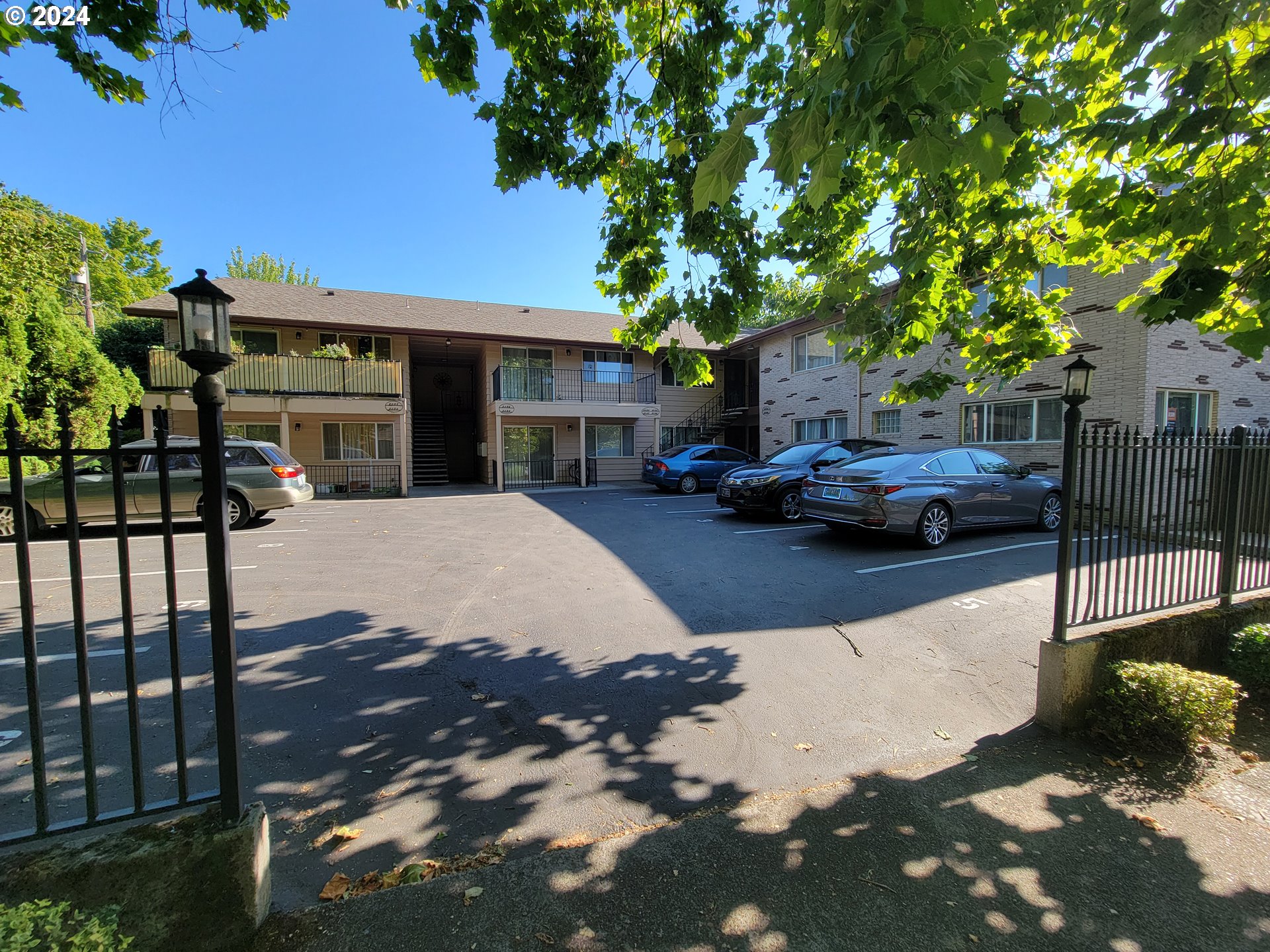 2022 Northeast Clackamas Street Portland, OR 97232 - Photo 1 of 13 a view of street with parked cars